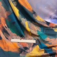 
              Viskose - fast vævet - grafisk malerstrøg - ORANGE/OKKER/SMARAGD farver på MØRK bund
            